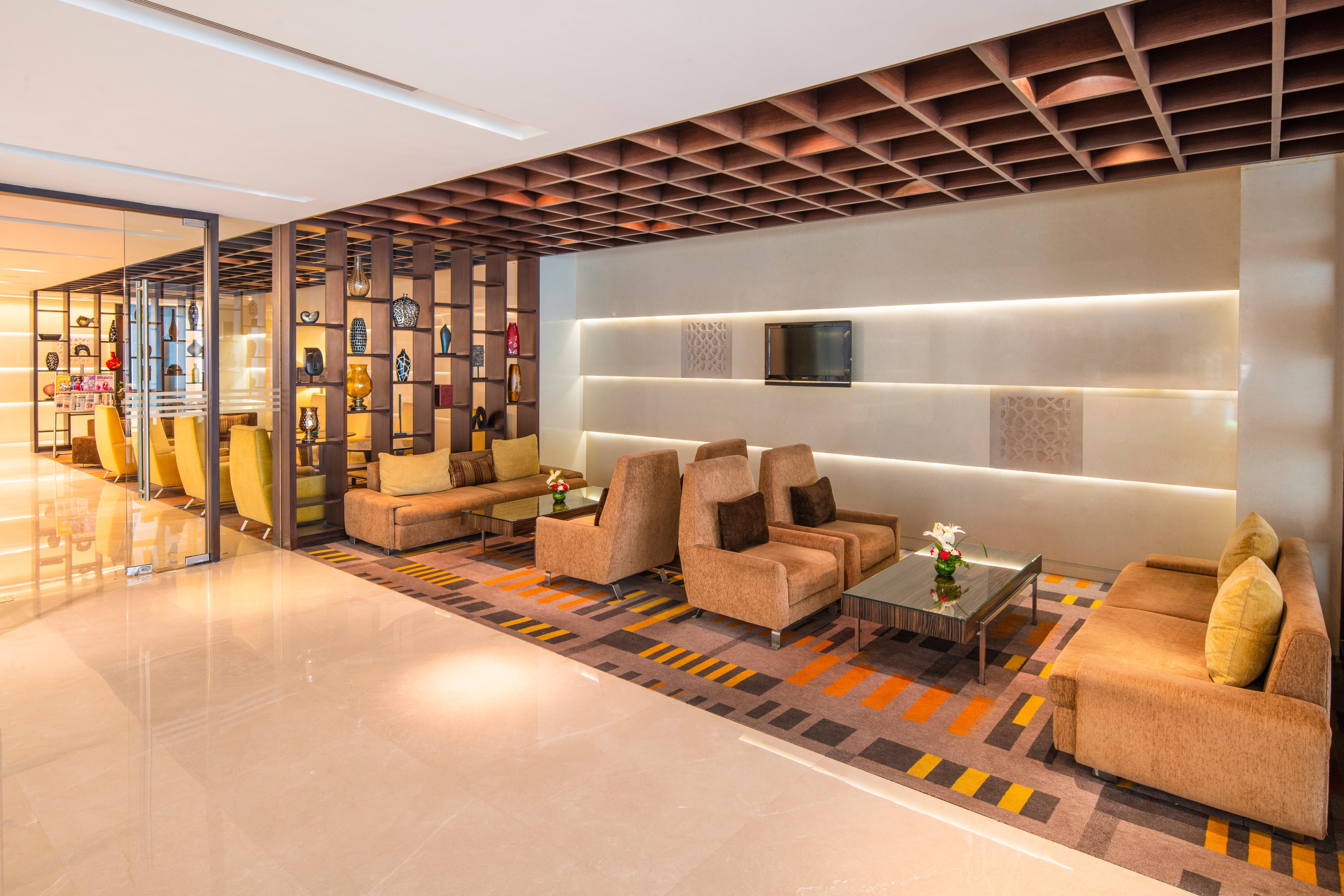 Holiday Inn Mumbai International Airport By Ihg Exterior foto The lounge at the airport